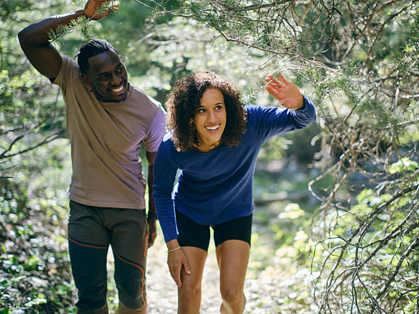 istock Young Couple on a Day Hike in the Forest 2218308682