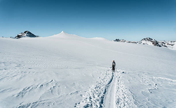 istock Distant view of backcountry skier on mountain 2218316535