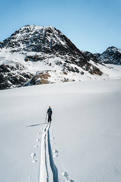 istock Distant view of backcountry skier on mountain 2218316593