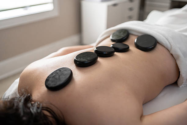 istock Hot stone massage at the beauty spa 2218323160