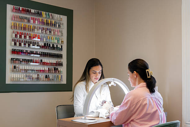 A chic beauty SPA clinic interior featuring gold accent furniture, white curtains, minimalist decor, creating a luxurious serene atmosphere ideal for professional treatment and personal care spaces.
