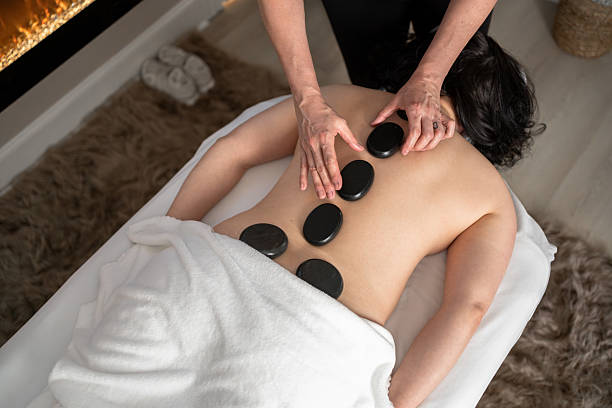 istock Hot stone massage at the beauty spa 2218323602