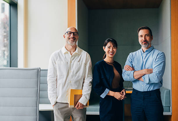 istock Confident Business Team Posing in Modern Office Environment 2218333090