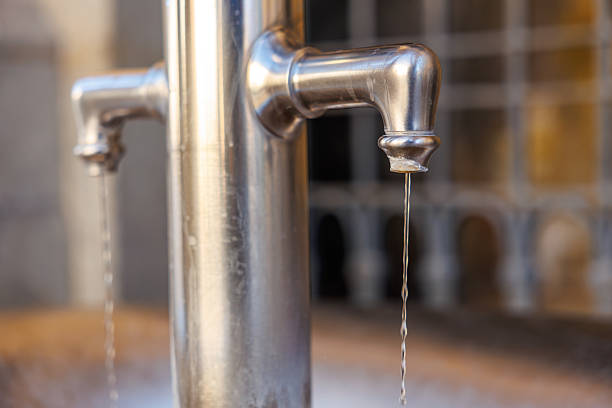 istock Stainless steel water faucets with continuous flow in outdoor setting 2218334289