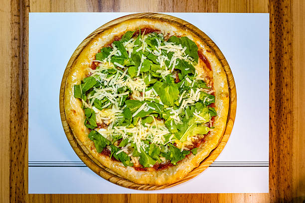 arugula and parmesan cheese pizza