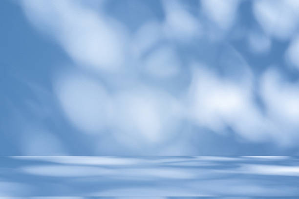 istock Studio style background wall decoration presentation uses white and blue tones. with shadows cast from a nearby window, concept creating a decorative 2218356998