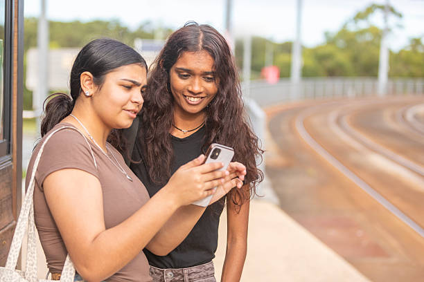 istock Australian aboriginal women waiting for a tram 2218358517
