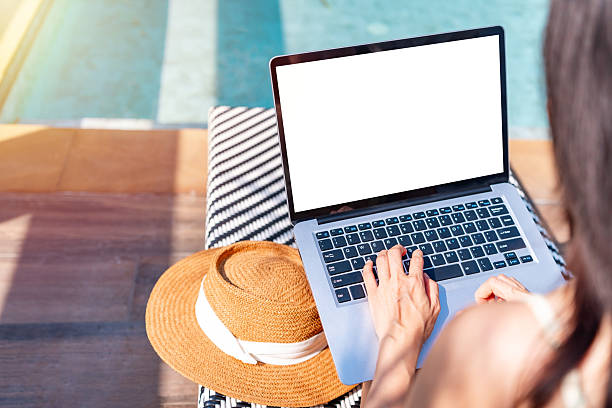istock Young woman freelancer traveler working online using laptop while traveling for summer vacation, Workation and digital nomad concept 2218360741