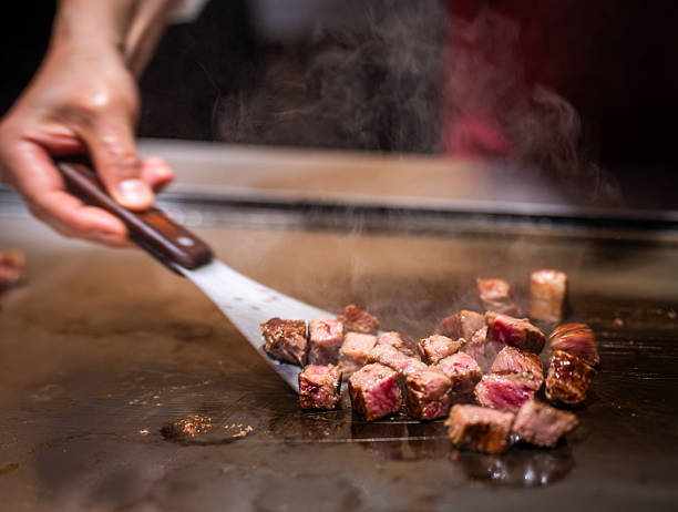 istock Grilling Kobe Beef Cubes on Teppanyaki Grill 2218361074