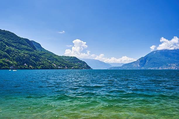 istock Scenic Lake Como with lush mountains and blue sky. 2218370758