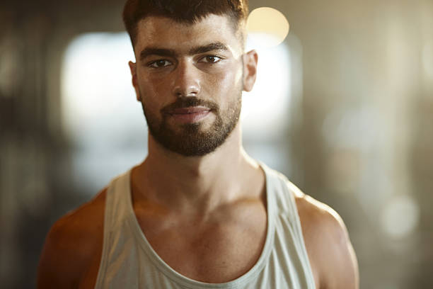istock Portrait of sweaty athletic man. 2218375722