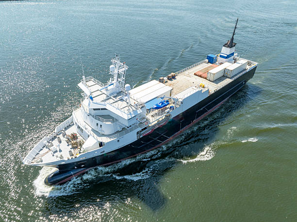 istock Reefer ship, refrigerated cargo vessel entering port seen from above 2218379363