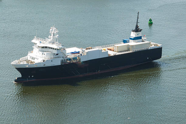 istock Reefer ship, refrigerated cargo vessel entering port seen from above 2218379392