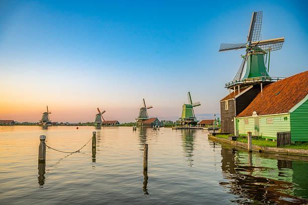 istock Zaanse Schans windmills during a summer sunset in Holland 2218379448