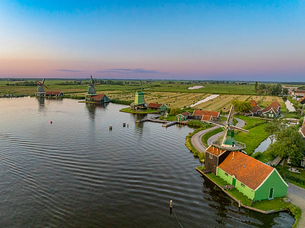 istock Zaanse Schans windmills during a summer sunset in Holland 2218379472