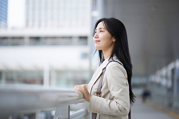 istock Young Japanese woman in a suit 2218382835