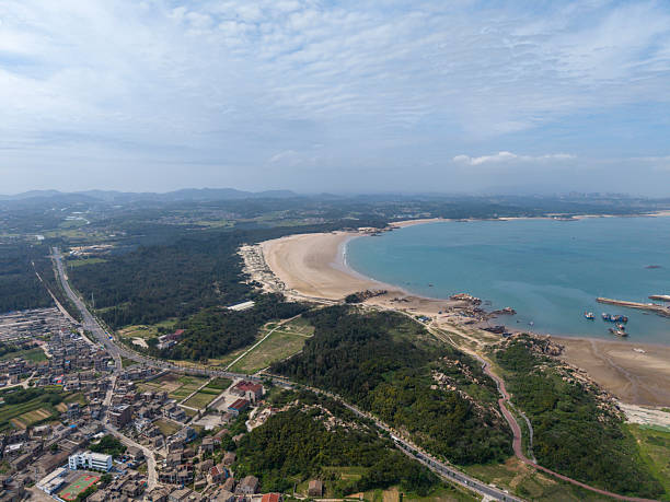 istock Coastal Townscape with Rocky Shoreline 2218388443