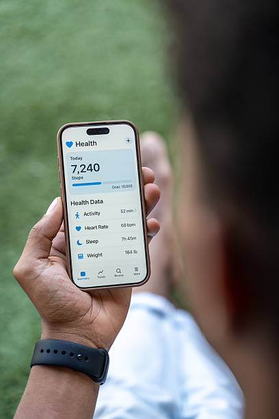 istock Man checking health data on smartphone after workout 2218391957