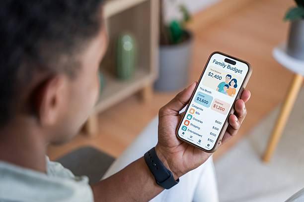 istock Man managing family budget using a financial app 2218392545