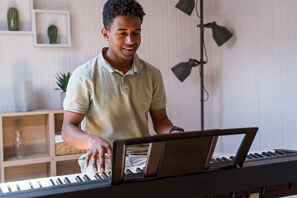 istock musician playing digital piano 2218393789
