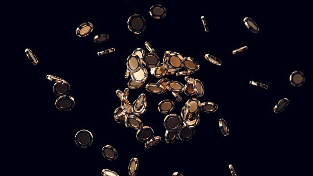 istock Flying gold chips in dark space with scattered layout 2218396207