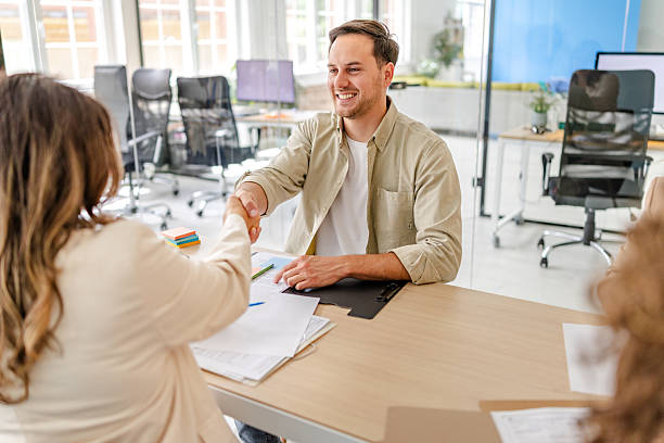 istock Business professionals engage in a productive meeting in a modern office setting during working hours 2218399575