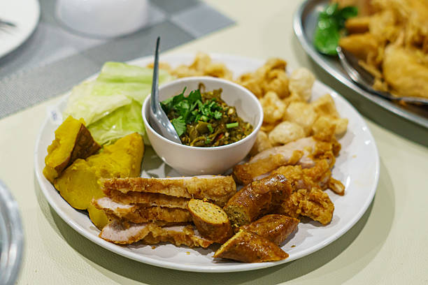 Traditional Northern Thai Appetizer Platter with Nam Prik and Assorted Sides