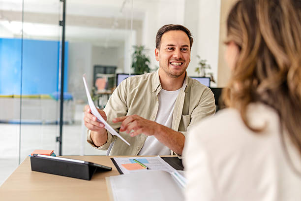 istock Collaboration between colleagues in a modern office space during a project meeting 2218400275