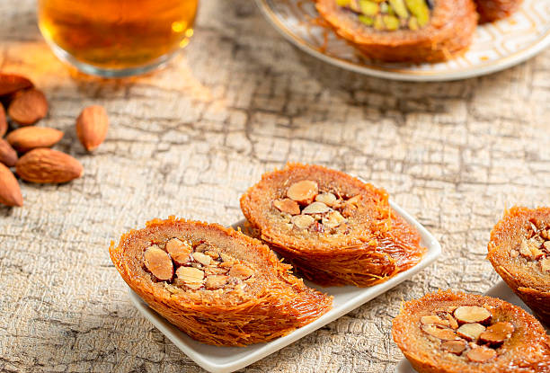 istock Almond rolls served with coffee, traditional Middle Eastern dessert 2218401116