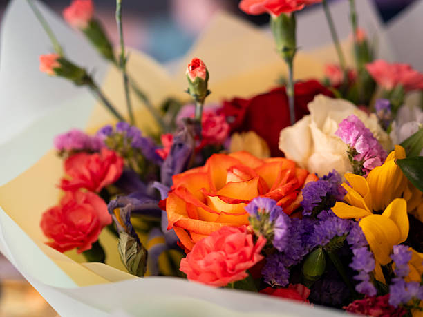 istock Colorful bouquet filled with roses and mixed flowers on display in a vibrant setting 2218401272