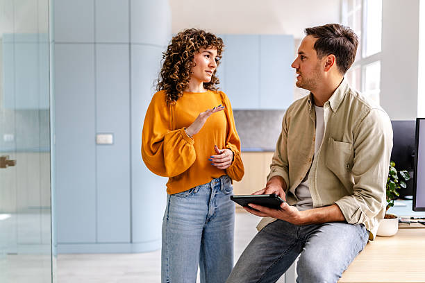 istock Colleagues discuss ideas while collaborating in a modern office environment during the day 2218401790