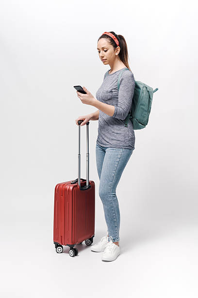 istock Young woman checking her smartphone 2218403954