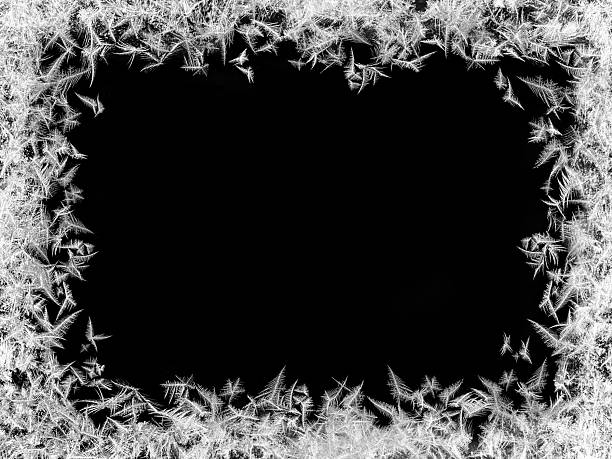 istock Beautiful white frost patterns arranged as frame on black background with clipping paths. Symbol of Christmas wonder. 2218408893