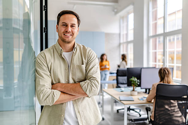 istock Office environment with professionals collaborating and enjoying their work in a modern, inviting setting 2218408980