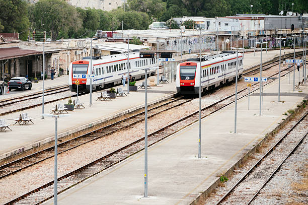 Railroad station platforms with passenger trains. Split, Croatia.