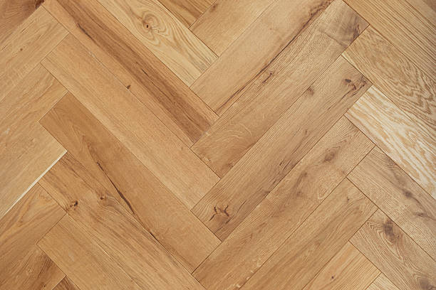istock Natural wooden oak parquet flooring background. Rustic floor pattern for interior and indoor home design top view. 2218416718