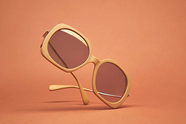 istock Sunglass with beige frame color 2218417393