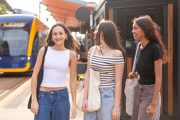 istock Group of young woman waiting for a tram 2218422603