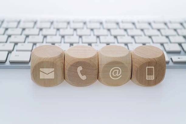 istock Contact us icons next to the computer keyboard 2218422803