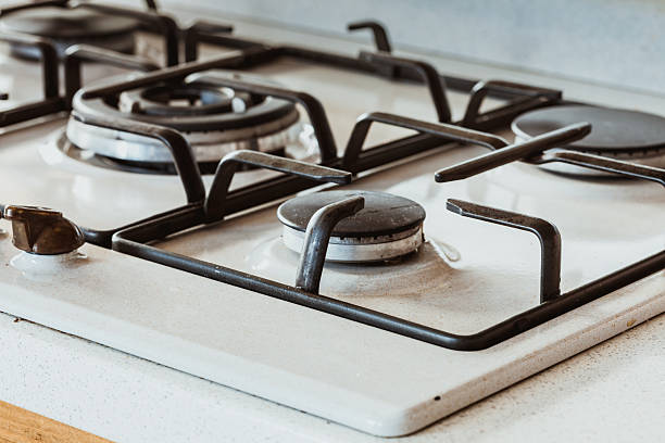 istock Clean gas kitchen stove on white metal 2218430226
