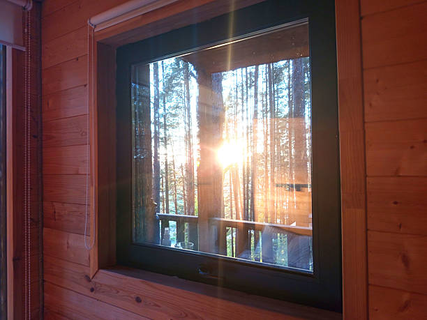 istock Panoramic window in a wooden house 2218433510