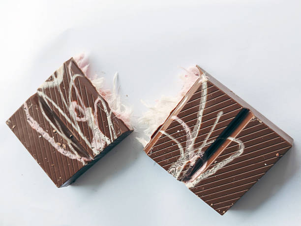 istock Gourmet chocolate dessert topped with delicate angel hair strands on solid background, minimalistic presentation of sweet and artistic confectionery 2218433769