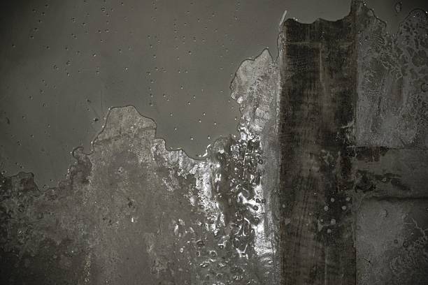 istock Abstract texture of wet concrete mixture close-up 2218439898