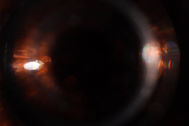 istock Background of dark lens flare lights. Abstract image 2218444910