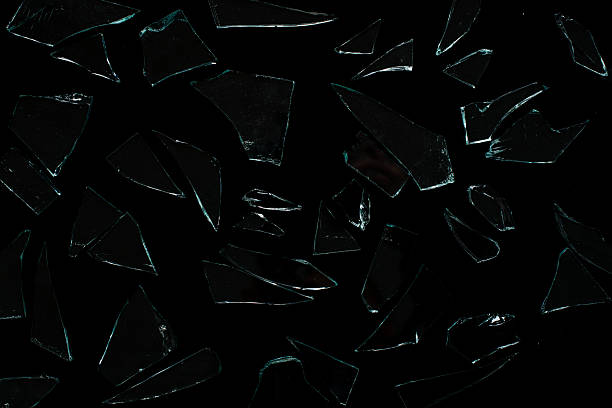 istock Abstract background of broken glass on black background. 2218445066