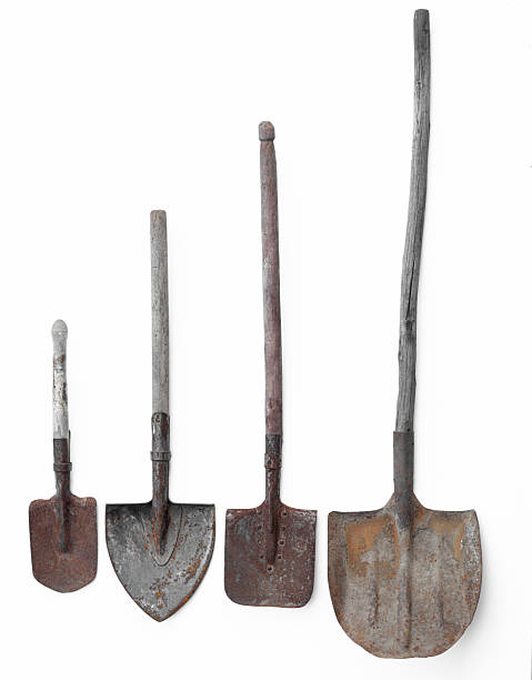 istock set of old rusty shovels isolated on white background 2218445810