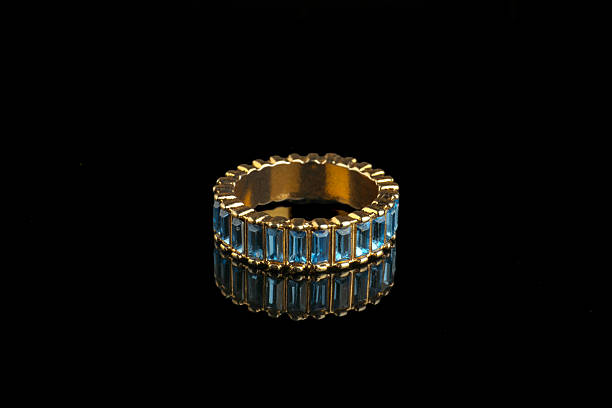 istock Beautiful bijouterie. Stylish ring on black background 2218446204