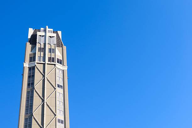 Oriental Hotel Hiroshima, Hiroshima, Japan- 8 Dec 2024: side view of the top of the high rise building in blue sky background with copy space