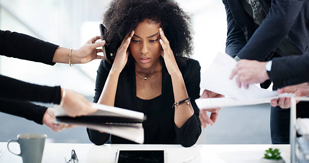 istock Business woman, hands and headache for multitasking in office with workload anxiety, pressure or deadline. Time management, person and overwhelmed with stress, phone call or paperwork procrastination 2218447916