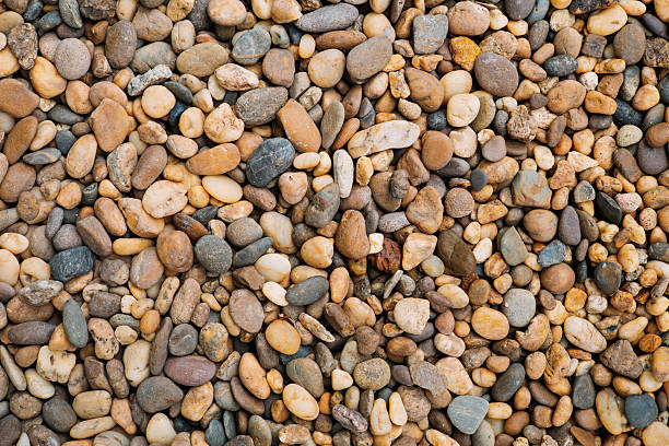 istock Several brown stones gathered on the ground. 2218453164